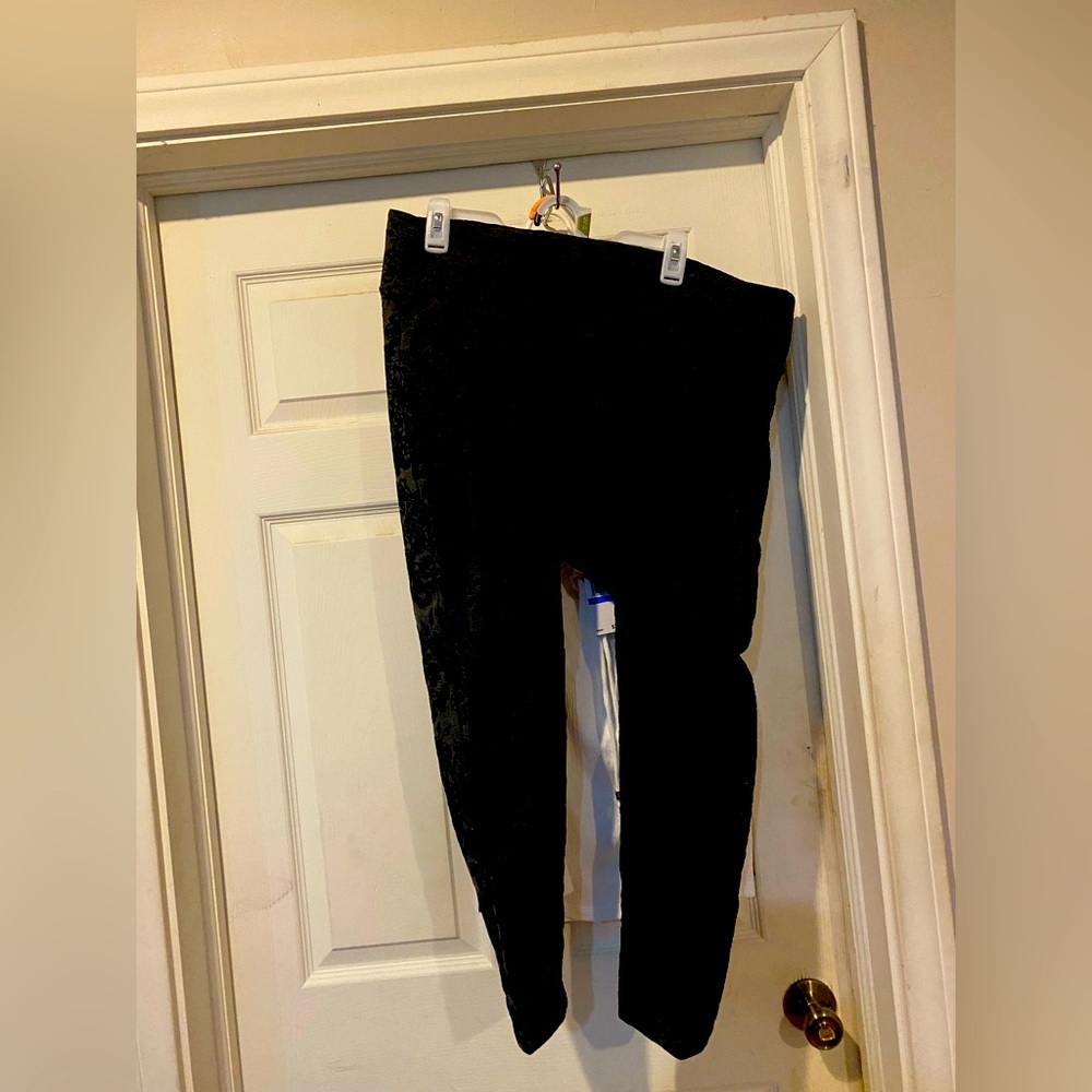 Black pant with plush flowers.  Stretchy slim leg